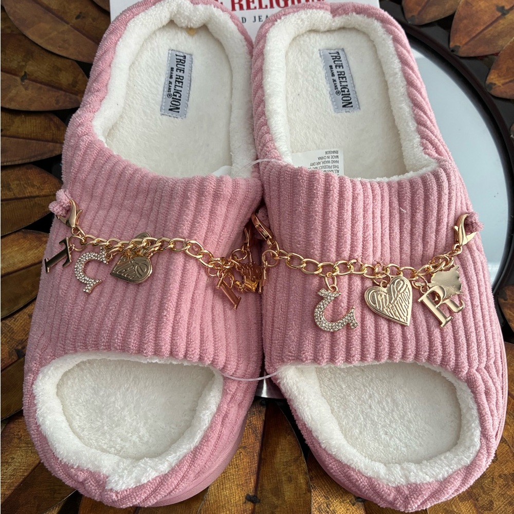 Pink slippers with charms